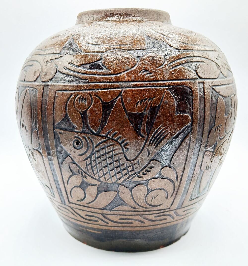 Vintage Asian Pottery Jar featuring designs of Fish, Bird, and Flowers